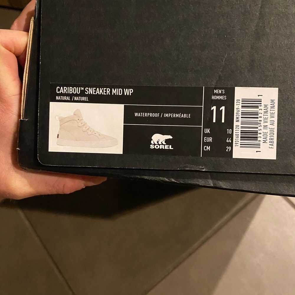 Brand new Sorel high top sneakers.